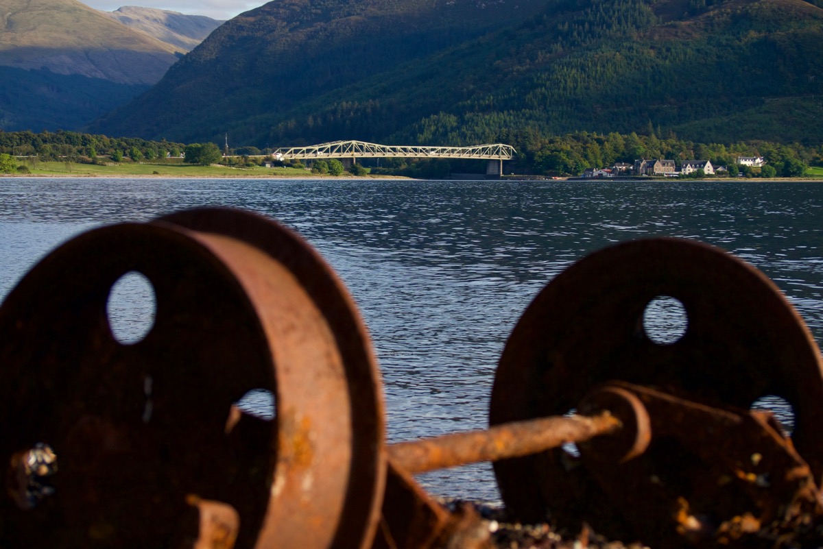 Ballachulish, Scotland bridge, with old train wheels in foreground